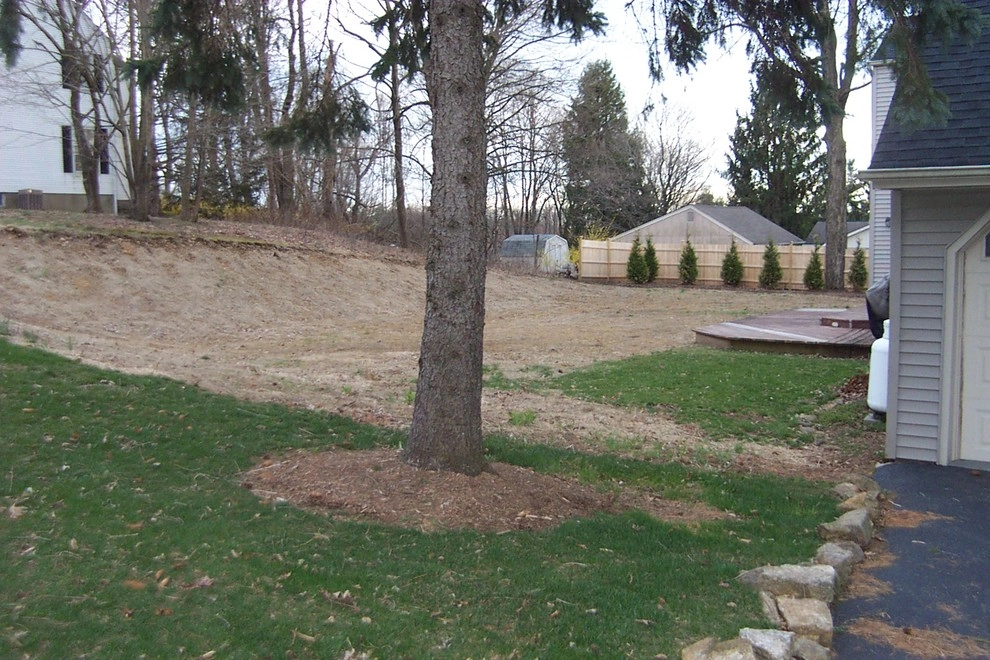 Retaining wall with fire pit seat wall by Bruno Design Associates - Photo 5
