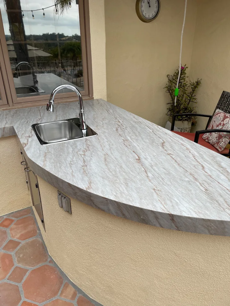 Grilled quartzite surfaces by CMG Granite And Stone Inc. - Photo 3