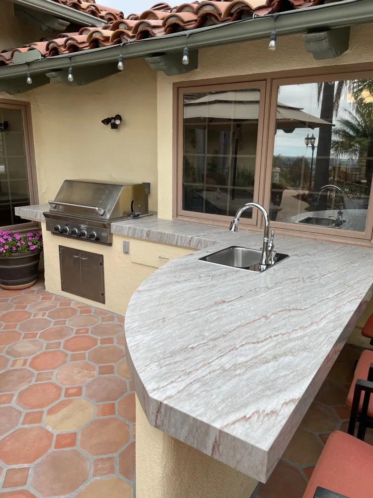 Grilled quartzite surfaces by CMG Granite And Stone Inc. - Photo 2