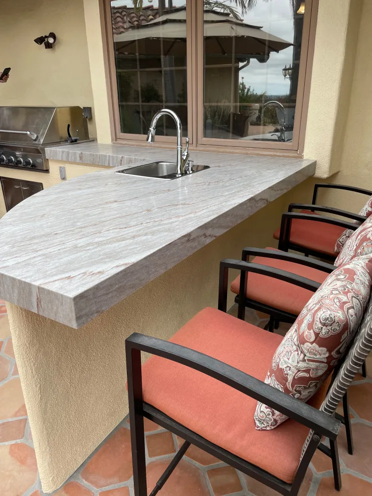 Grilled quartzite surfaces by CMG Granite And Stone Inc. - Photo 6