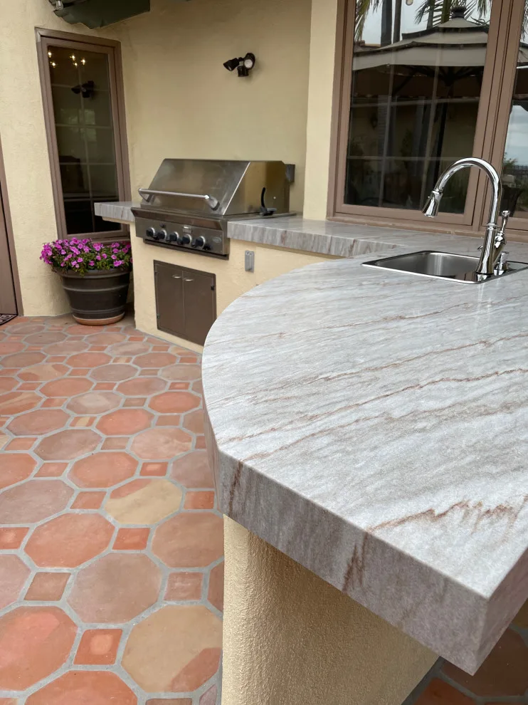 Grilled quartzite surfaces by CMG Granite And Stone Inc. - Photo 4