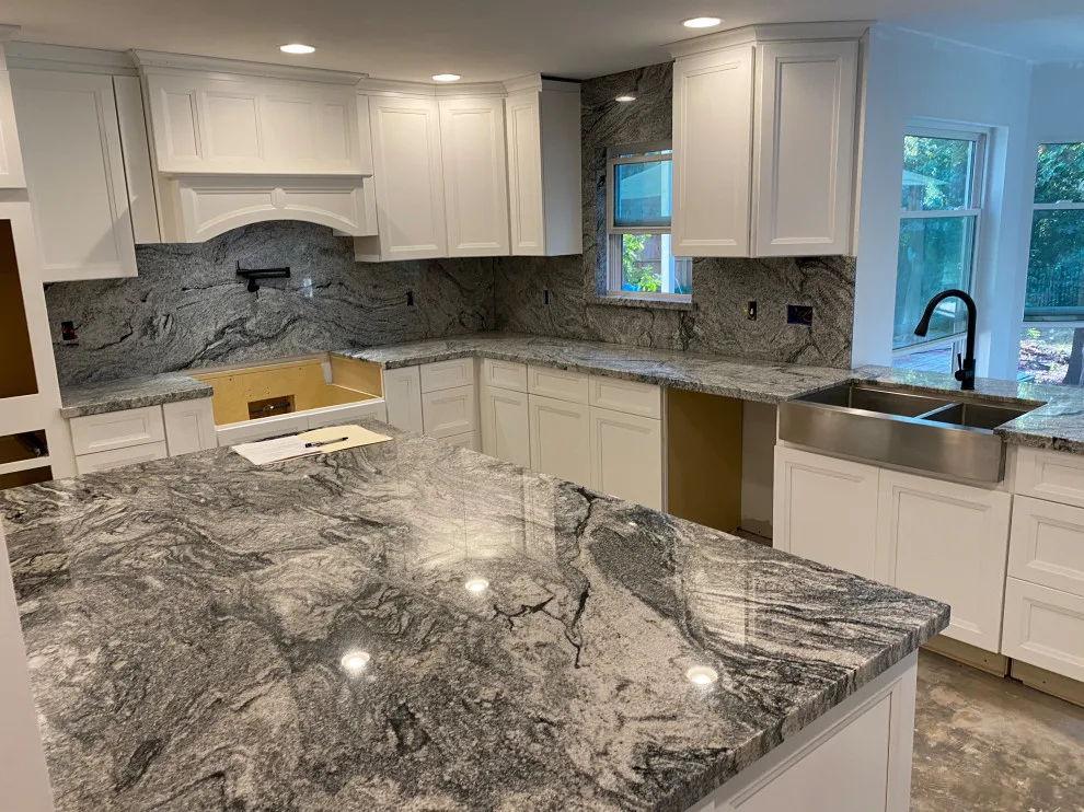 Kitchen featuring a complete backsplash in Viscount white granite by Stones & Designers - Photo 3
