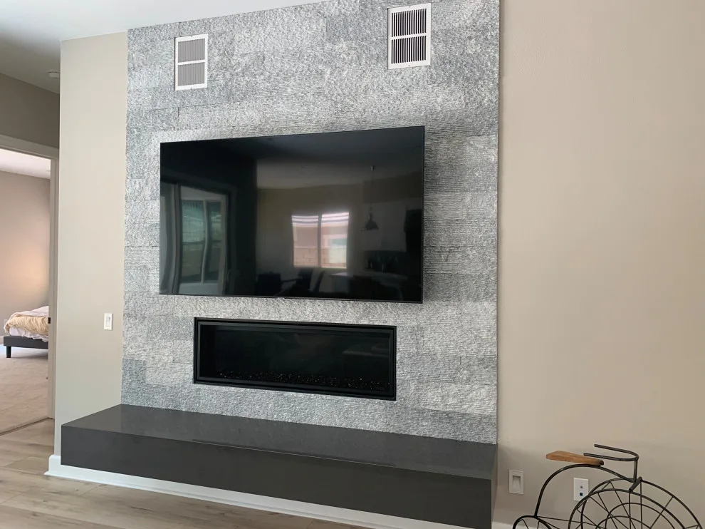 Natural stone backsplash for fireplace hearth by CMG Granite And Stone Inc. - Photo 2