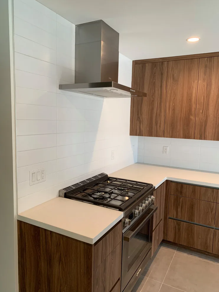 Quartz Surfaces with Tile Accent by CMG Granite And Stone Inc. - Photo 3