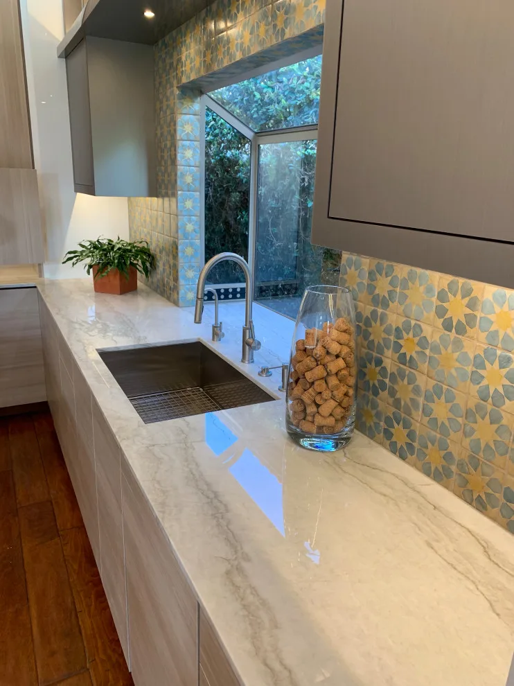 Quartzite Stone Kitchen Countertops with Tiled Backsplash by CMG Granite And Stone Inc. - Photo 7