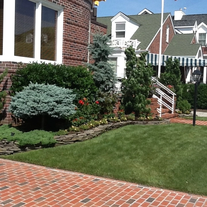 Traditional Outdoor Design by Kãsa Landscaping & Property Management - Photo 2