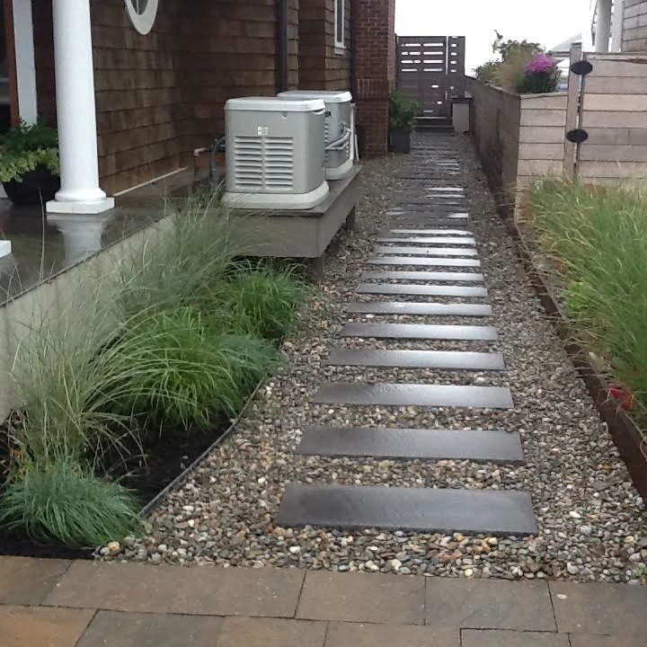 Pebbled Pathway by Kãsa Landscaping & Property Management - Photo 2