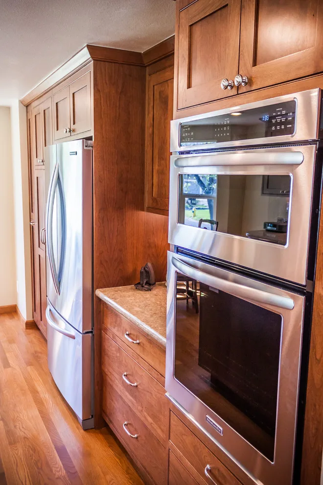 Crystal Cabinet Works - Swan Kitchen Renovation by Surface Art Countertops - Photo 39