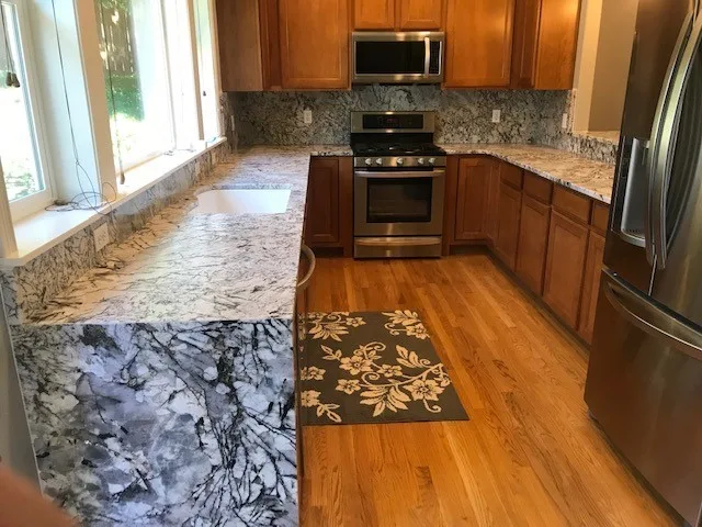 Stonework Kitchens by Tops Solid Surface - Photo 43