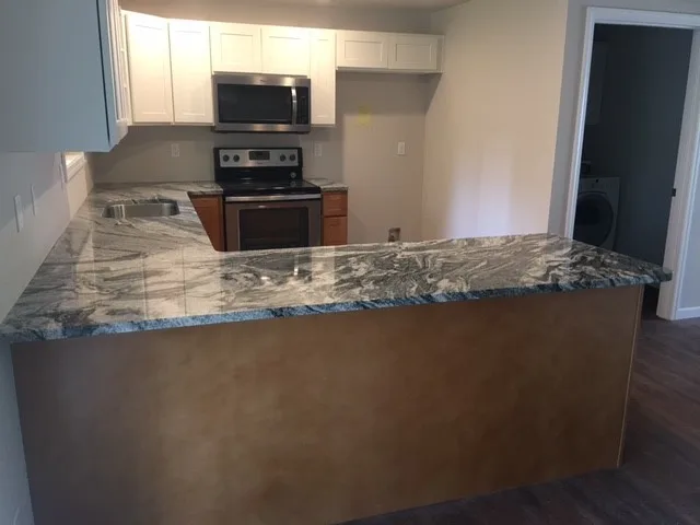 Stonework Kitchens by Tops Solid Surface - Photo 153