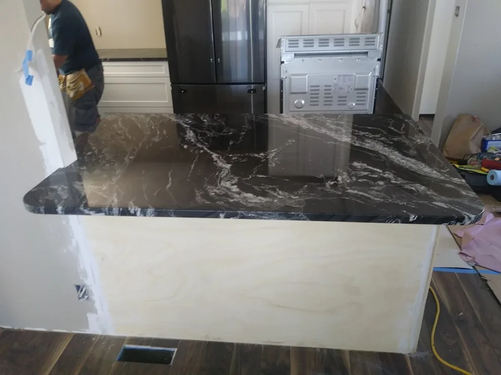 Stonework Kitchens by Tops Solid Surface - Photo 17