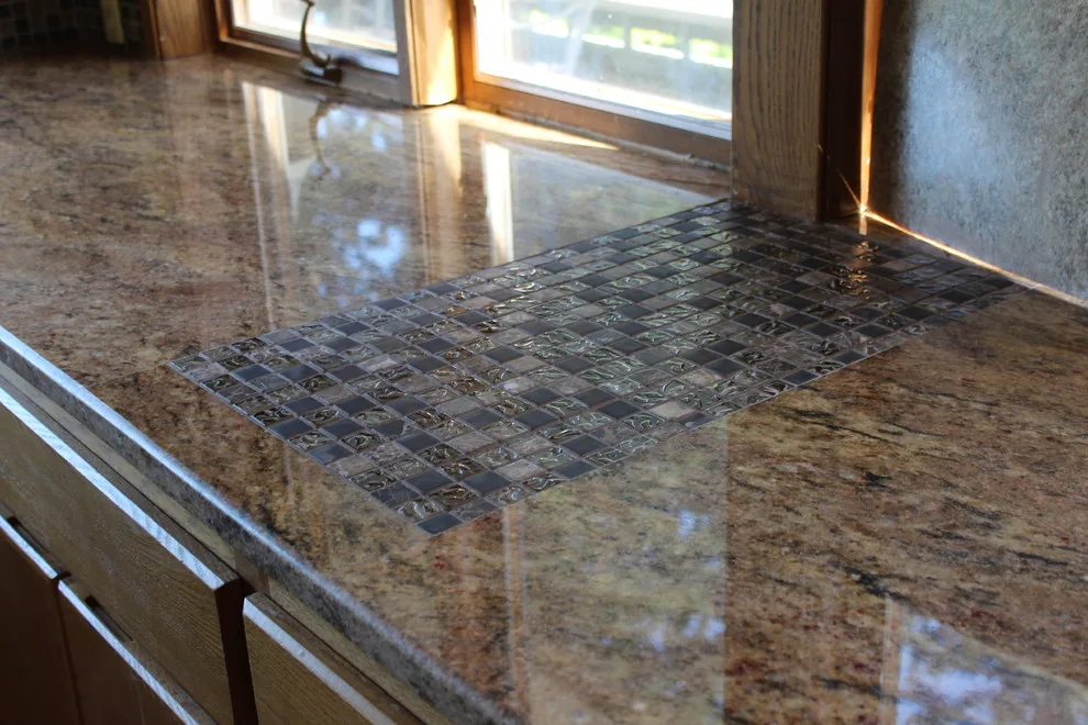 Ornamental Backsplashes by Tops Solid Surface - Photo 12
