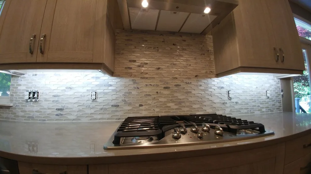 Ornamental Backsplashes by Tops Solid Surface - Photo 13