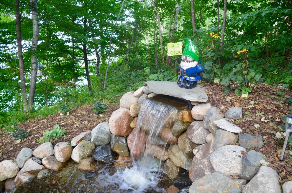 Lakeside waterfall by Landsburg Landscape Nursery - Photo 16