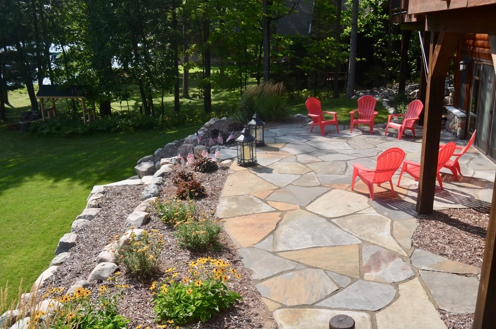 Flagstone patio, retaining wall and rain garden by Landsburg Landscape Nursery - Photo 9