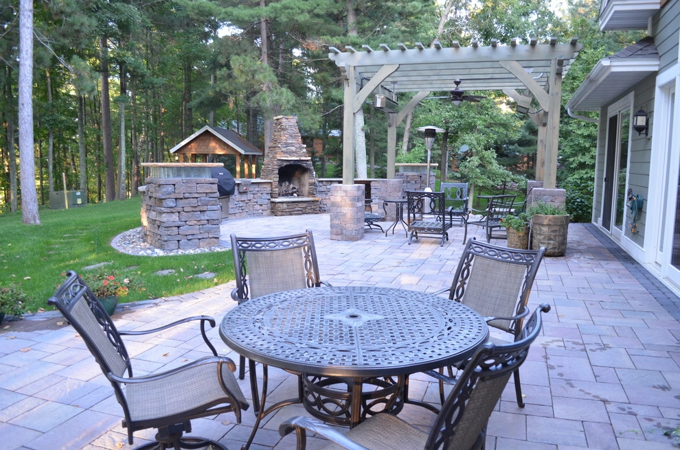 Outdoor kitchen and firepit by Landsburg Landscape Nursery - Photo 5