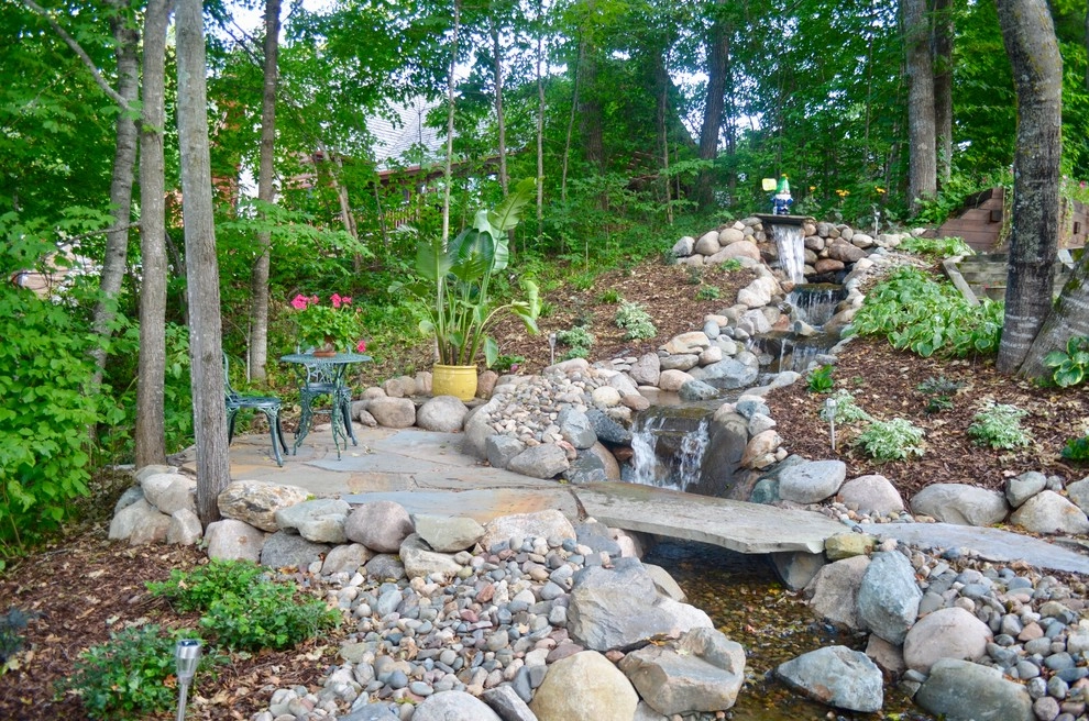 Lakeside waterfall by Landsburg Landscape Nursery - Photo 17