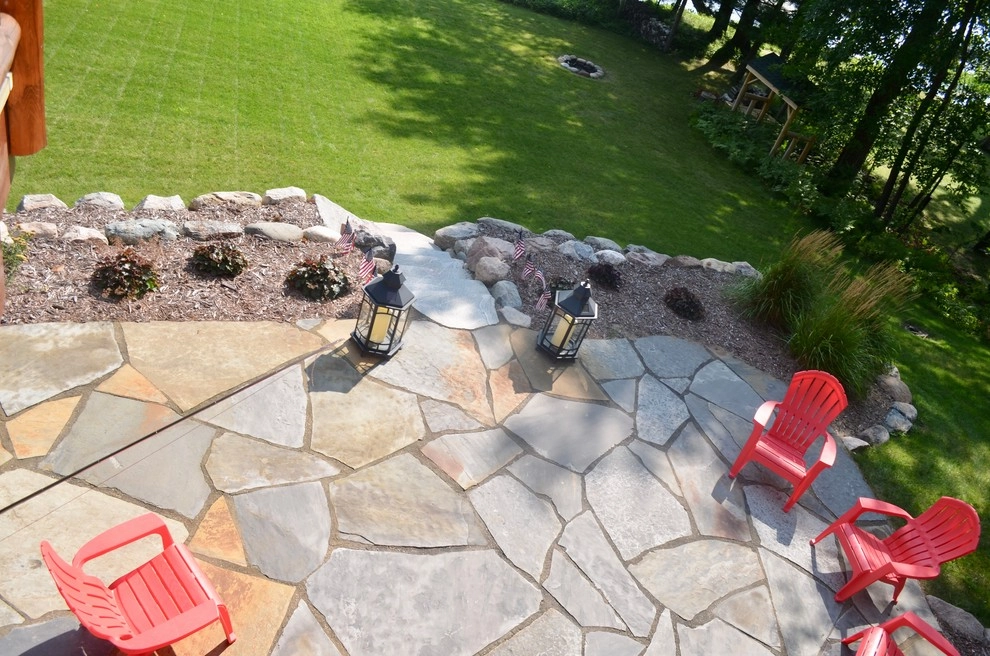 Flagstone patio, retaining wall and rain garden by Landsburg Landscape Nursery - Photo 3