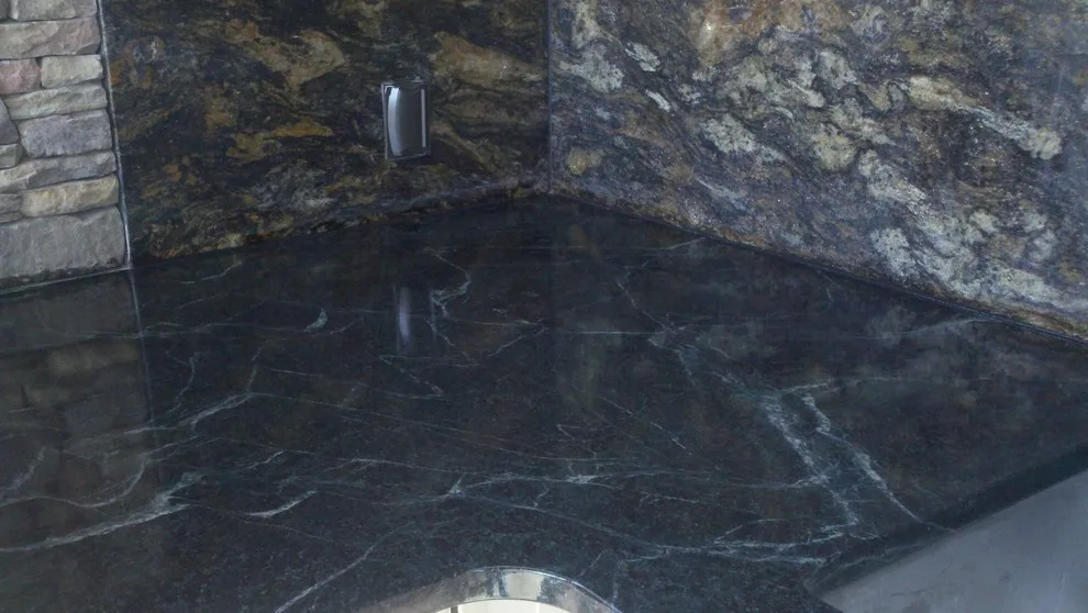 Stunning Outdoor Kitchen by Custom Granite Interior - Photo 7