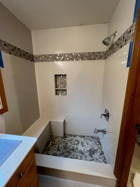 Restroom Renovations by Tops Solid Surface - Photo 19