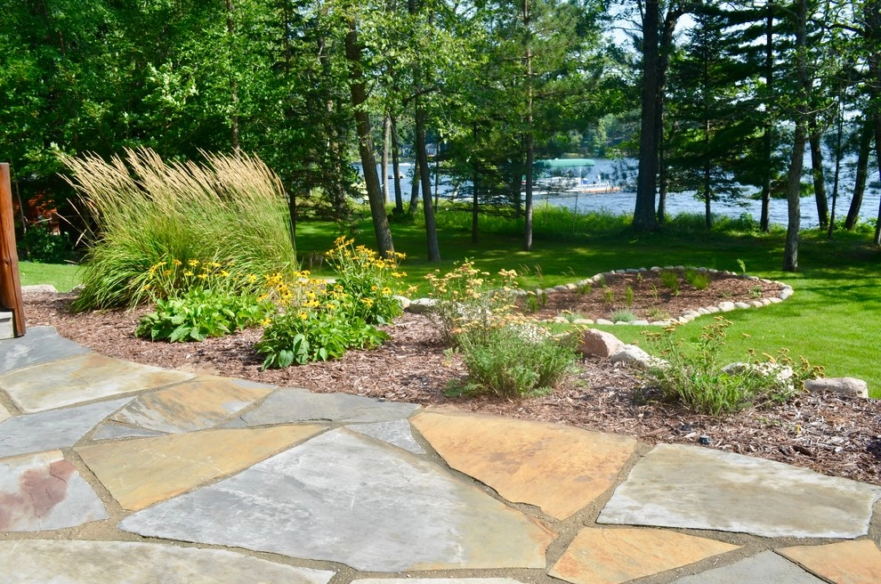 Flagstone patio, retaining wall and rain garden by Landsburg Landscape Nursery - Photo 10