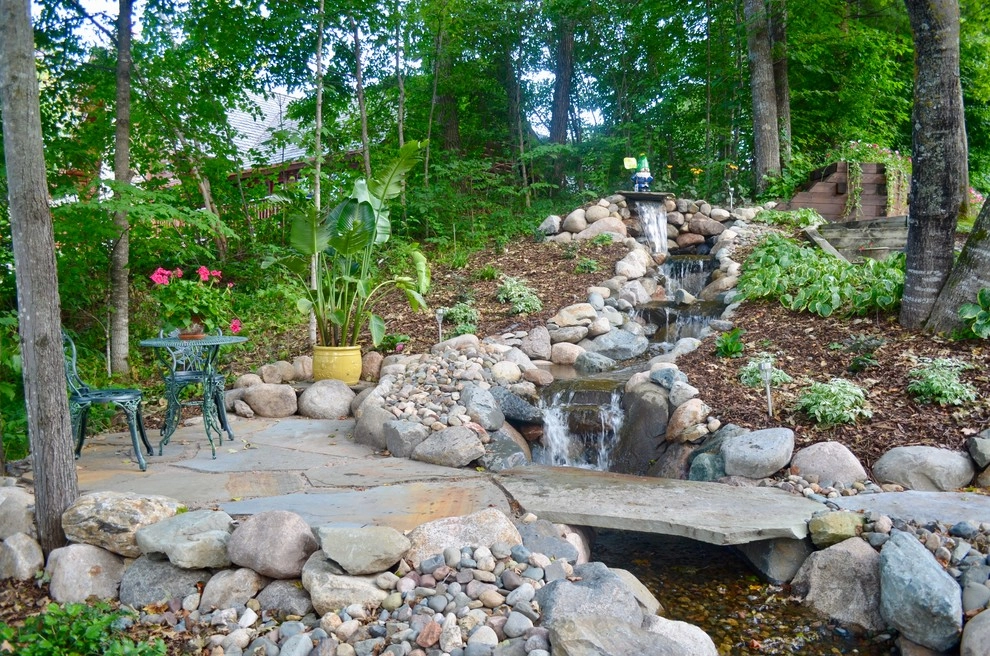 Lakeside waterfall by Landsburg Landscape Nursery - Photo 10