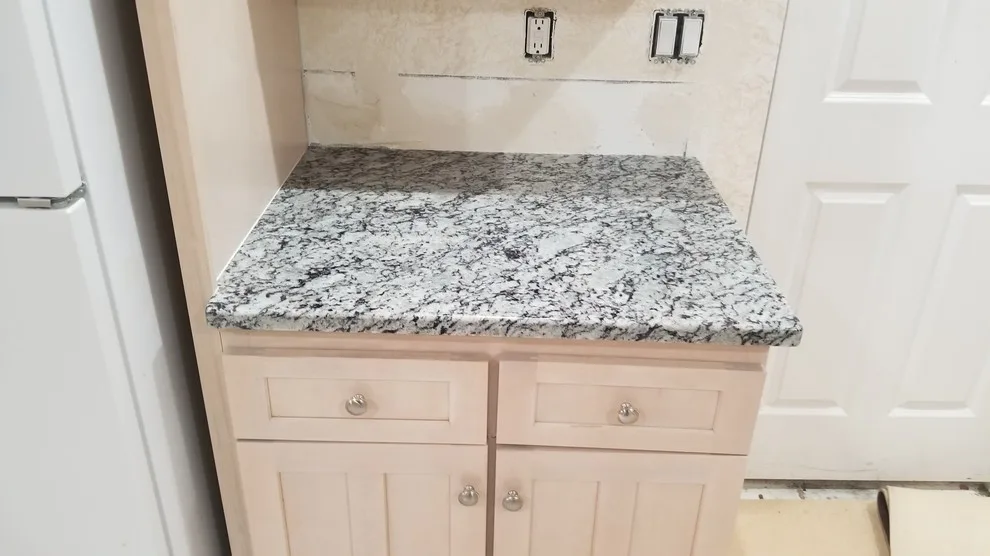 Frosted Bianco Granite Countertops by Tops Solid Surface - Photo 10
