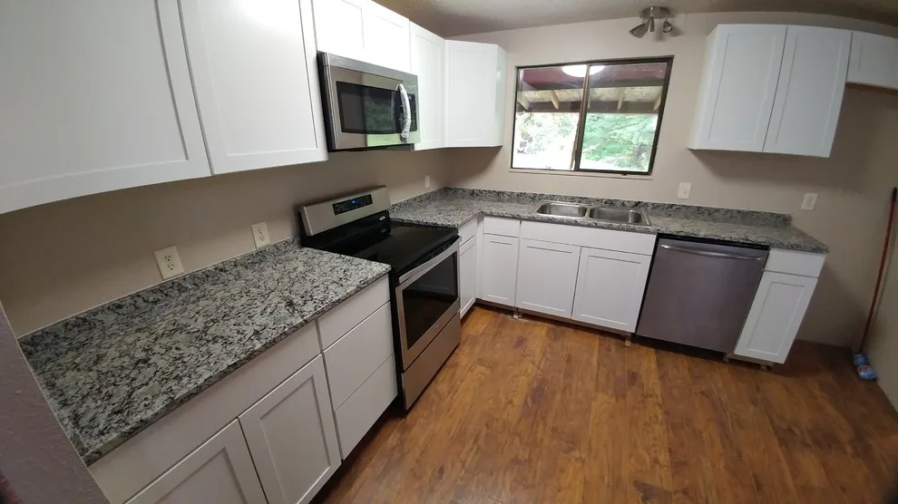 Frosted Bianco Granite Countertops by Tops Solid Surface - Photo 6