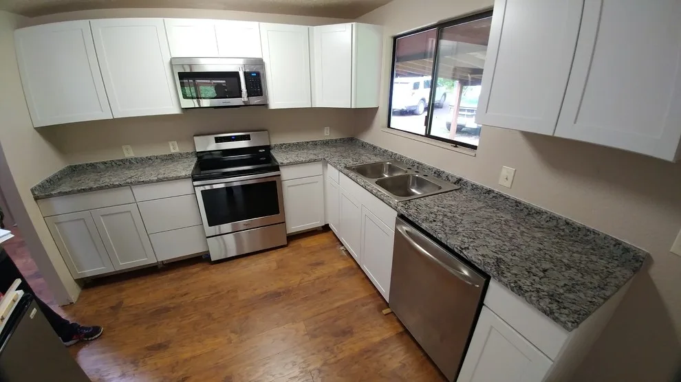 Frosted Bianco Granite Countertops by Tops Solid Surface - Photo 4