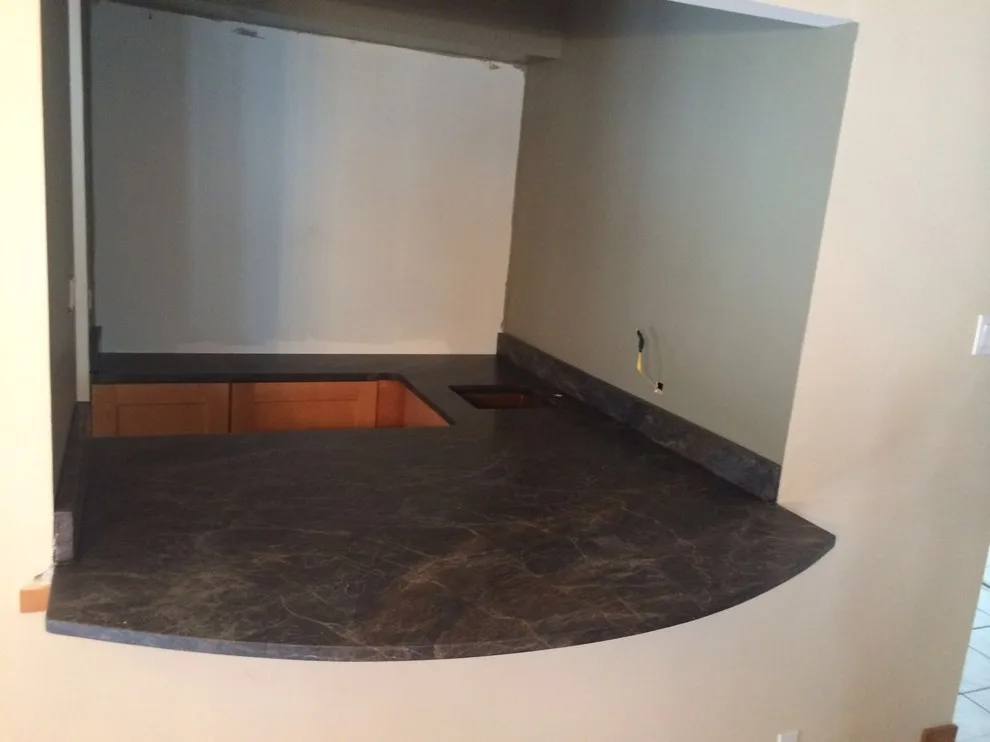 Dark countertops by Ilkem Marble & Granite Inc - Photo 6