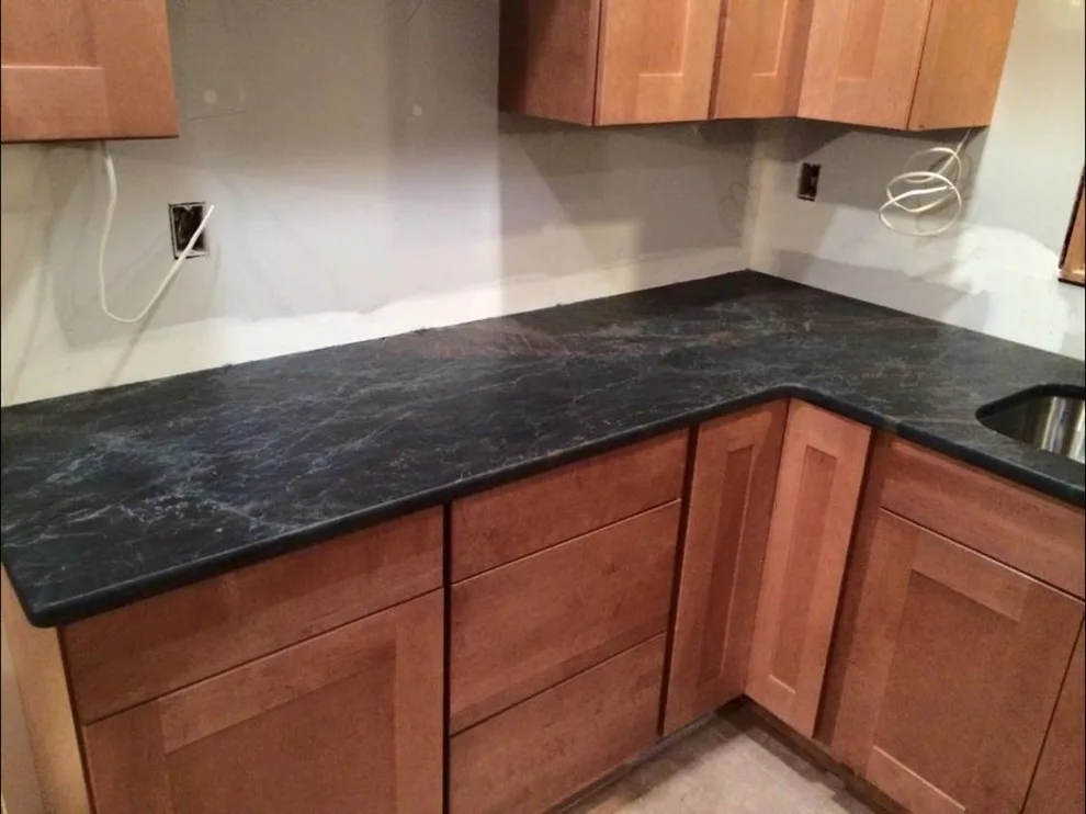 Dark countertops by Ilkem Marble & Granite Inc - Photo 10