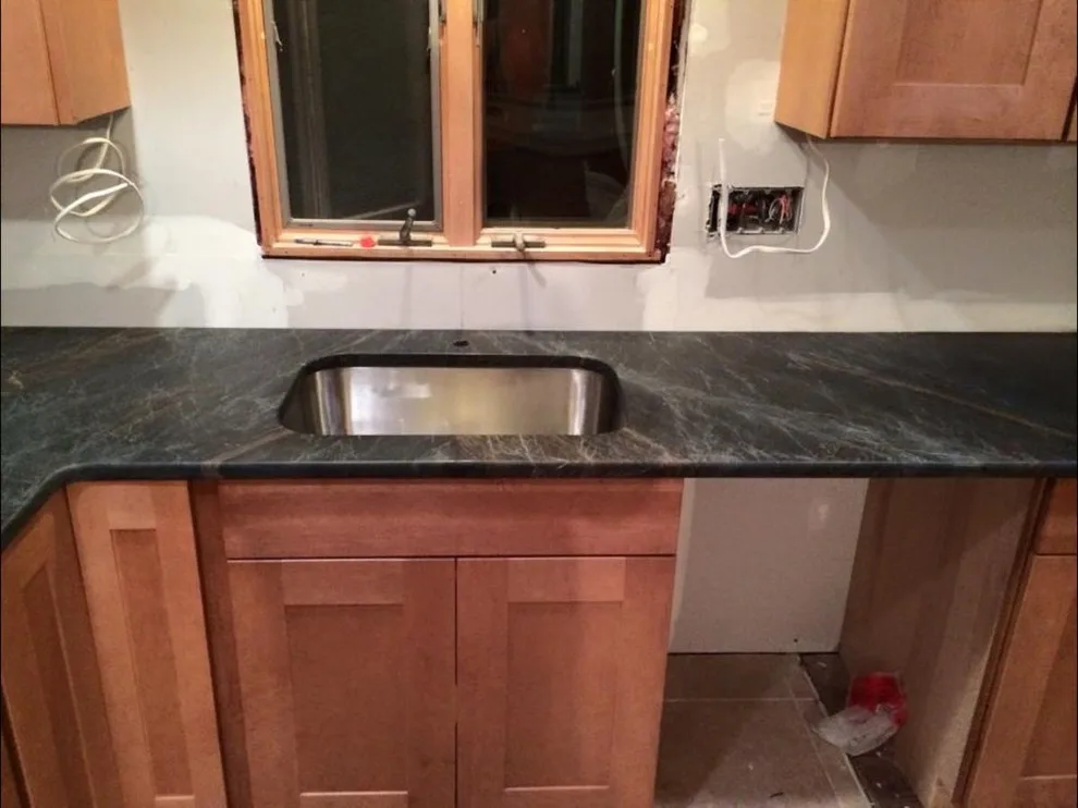 Dark countertops by Ilkem Marble & Granite Inc - Photo 13