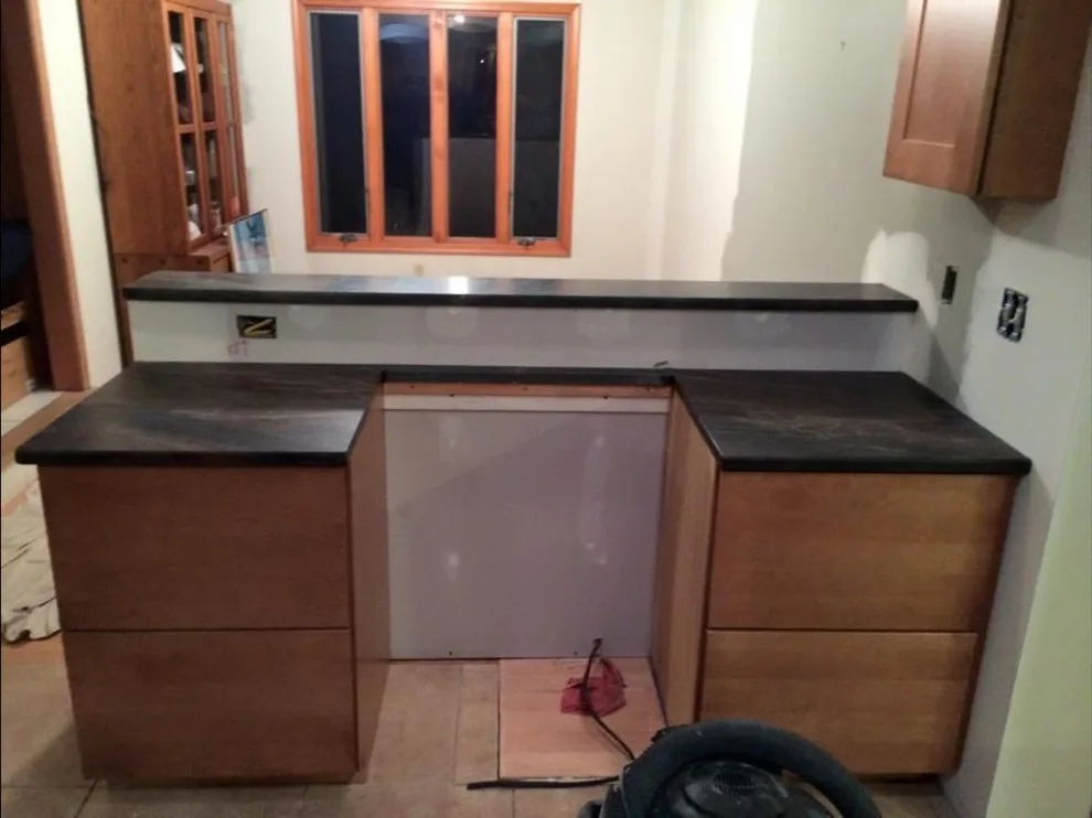 Dark countertops by Ilkem Marble & Granite Inc - Photo 9