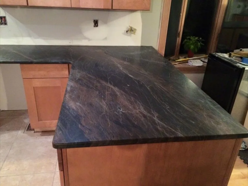 Dark countertops by Ilkem Marble & Granite Inc - Photo 7