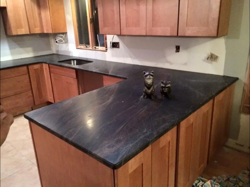 Dark countertops by Ilkem Marble & Granite Inc - Photo 2