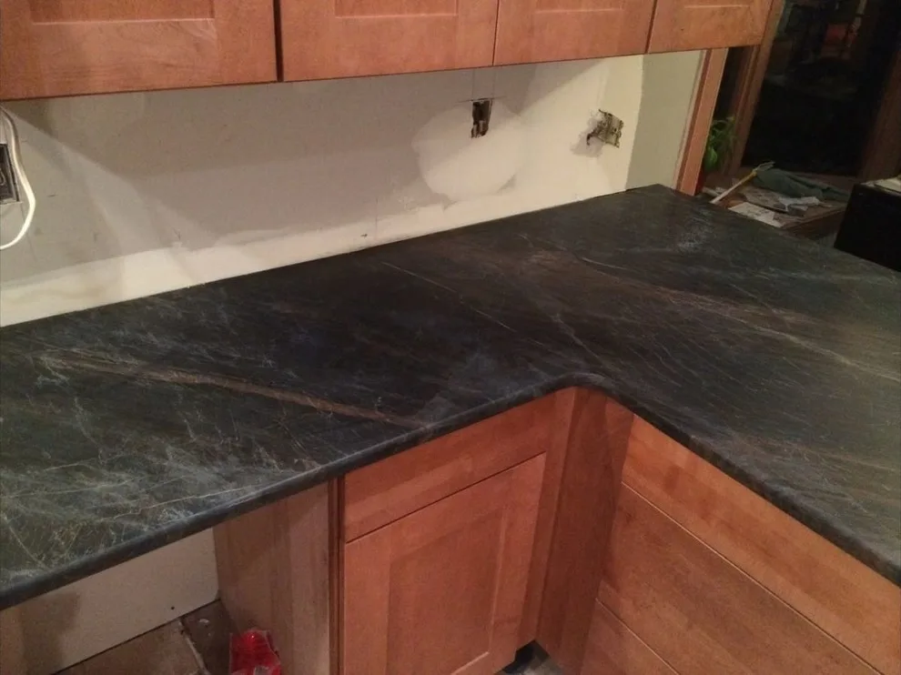Dark countertops by Ilkem Marble & Granite Inc - Photo 8