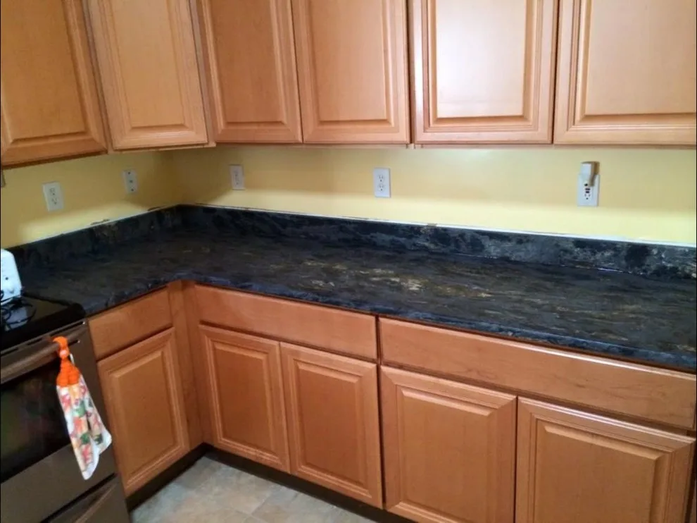 Dark countertops by Ilkem Marble & Granite Inc - Photo 3