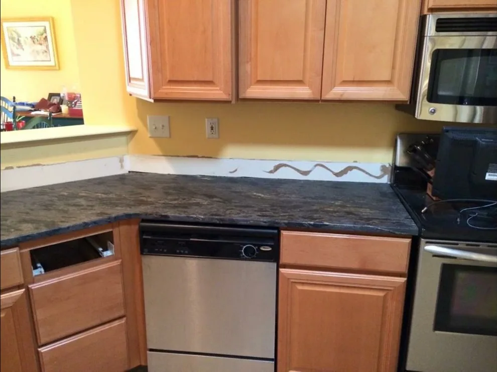 Dark countertops by Ilkem Marble & Granite Inc - Photo 12