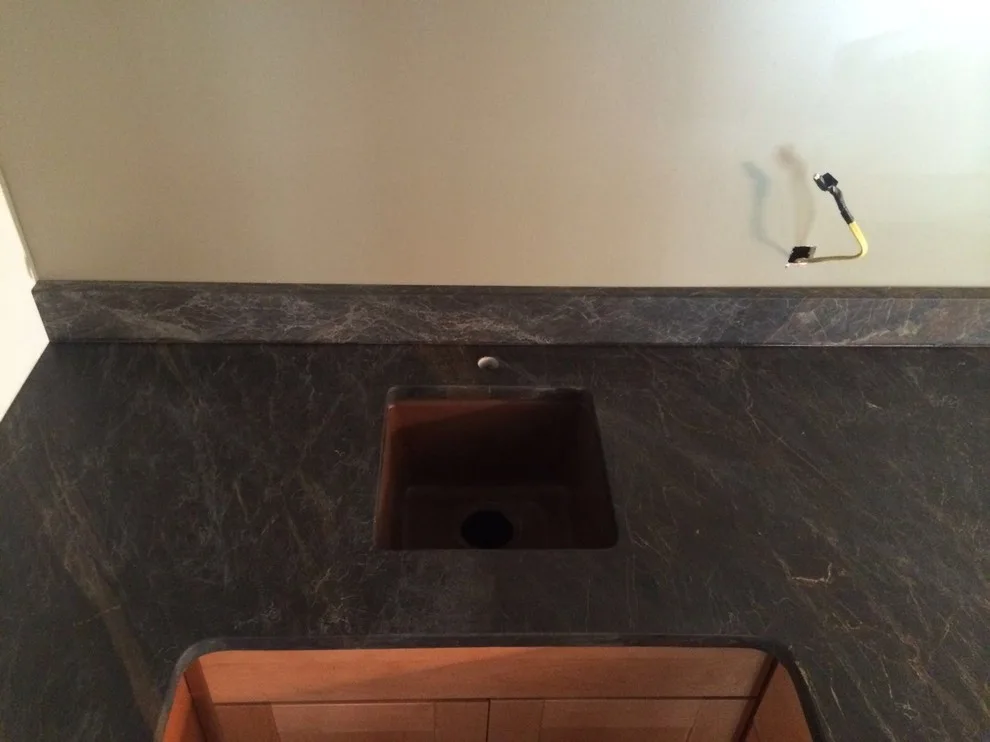 Dark countertops by Ilkem Marble & Granite Inc - Photo 11