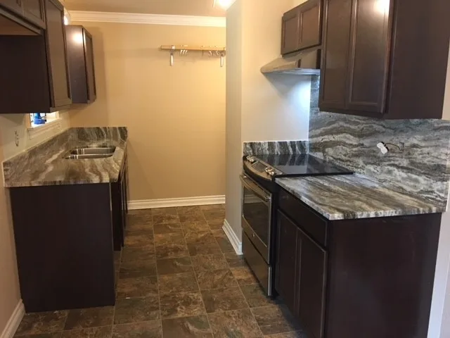 Brown Fantasy Granite Surfaces by Tops Solid Surface - Photo 52