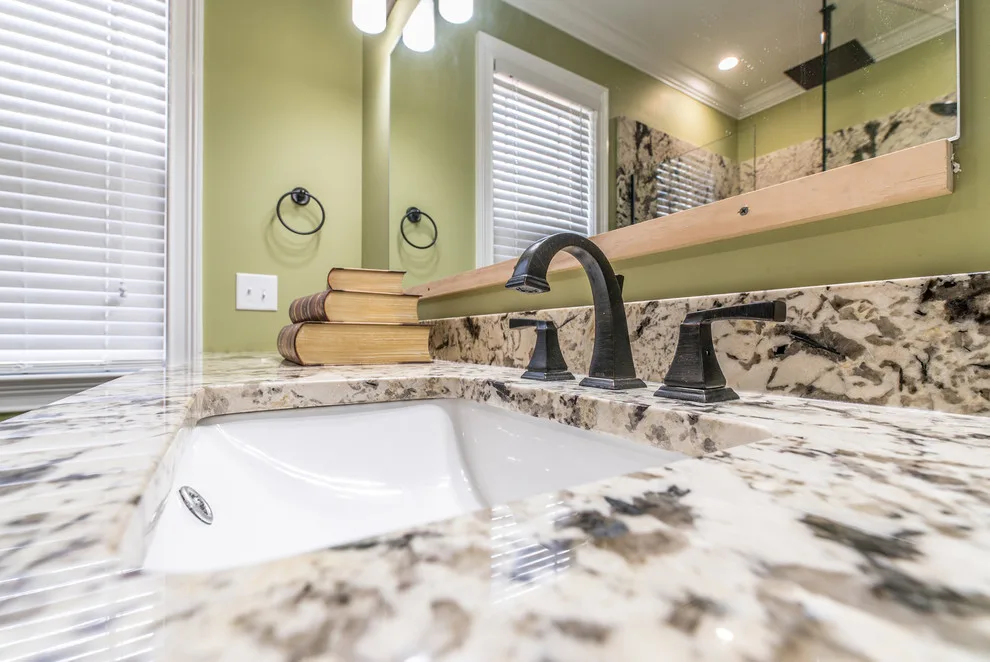 Elegant White Granite Bathroom Countertops by East Coast Granite & Tile - Photo 9