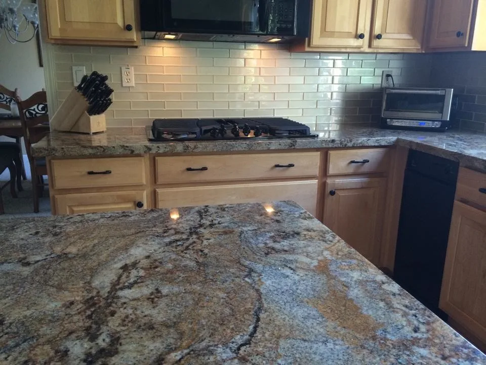 Kitchen Backsplash of Granite and Glass by Family Floors & More - Photo 3
