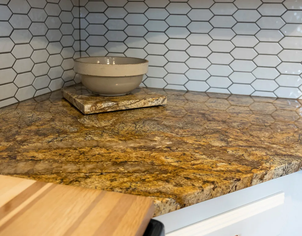 Granite Enhances Black and White Kitchen Appeal by WilgusIQ - Photo 3