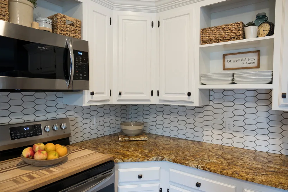 Granite Enhances Black and White Kitchen Appeal by WilgusIQ - Photo 2