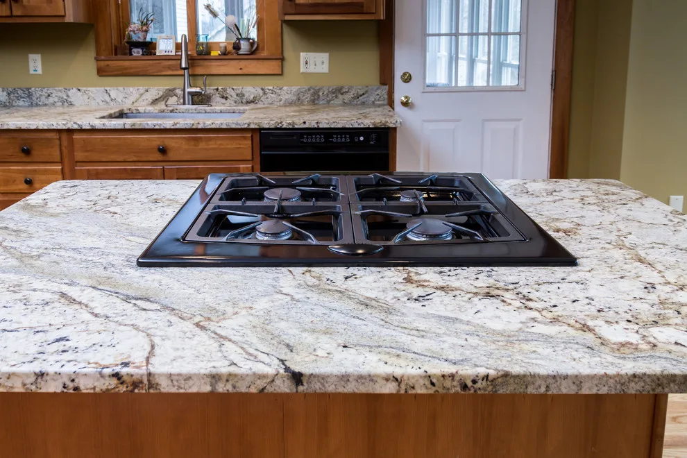 Bordeaux Kitchen with Leathered Typhoon Design by Northern Granite And Marble - Photo 12