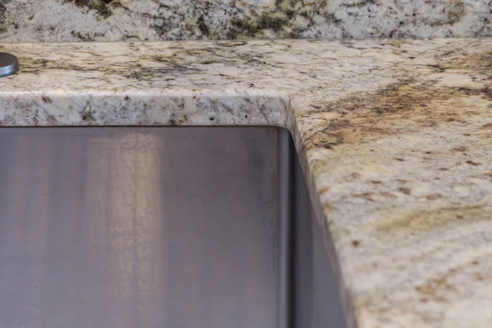 Bordeaux Kitchen with Leathered Typhoon Design by Northern Granite And Marble - Photo 9