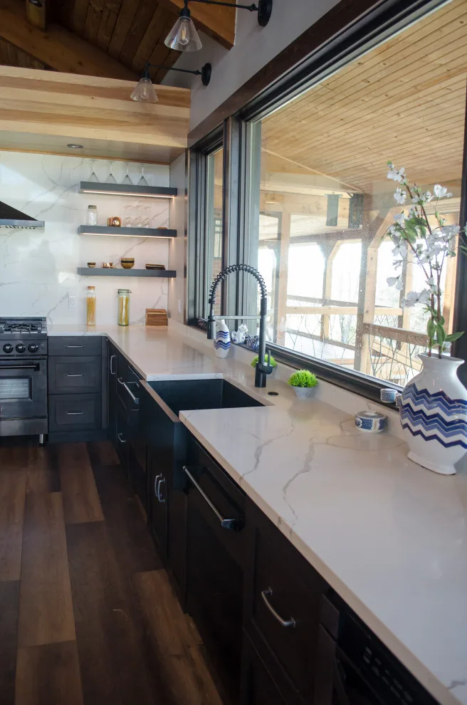Contemporary Kitchen with Black Cabinets and Marbled Quartz by WilgusIQ - Photo 2