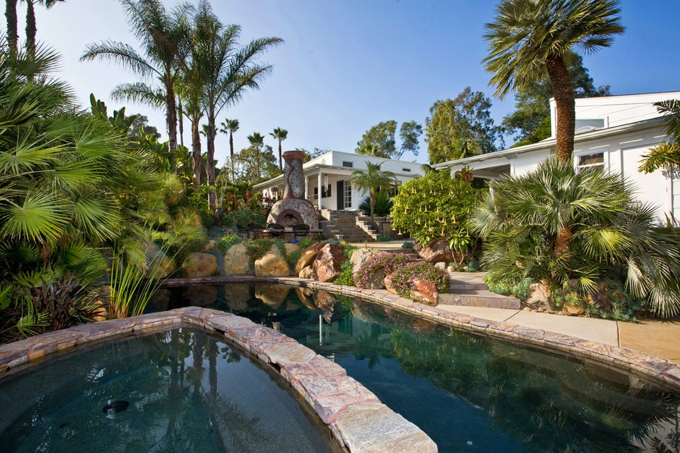 Backyard Landscape Design with Pool, Fireplace, and Custom Stonework by C & H Gardens Artistic Landscape & Tree Service - Photo 7