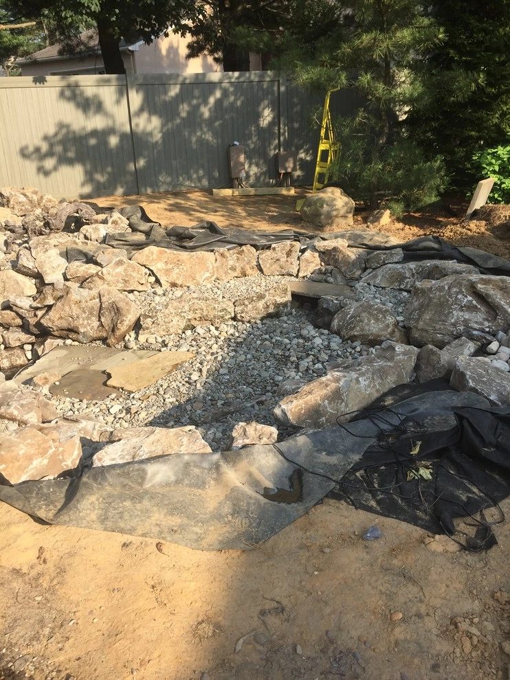 Large Pond Rebuild with Wetlands & Waterfall by Landvista Aquascapes - Photo 2