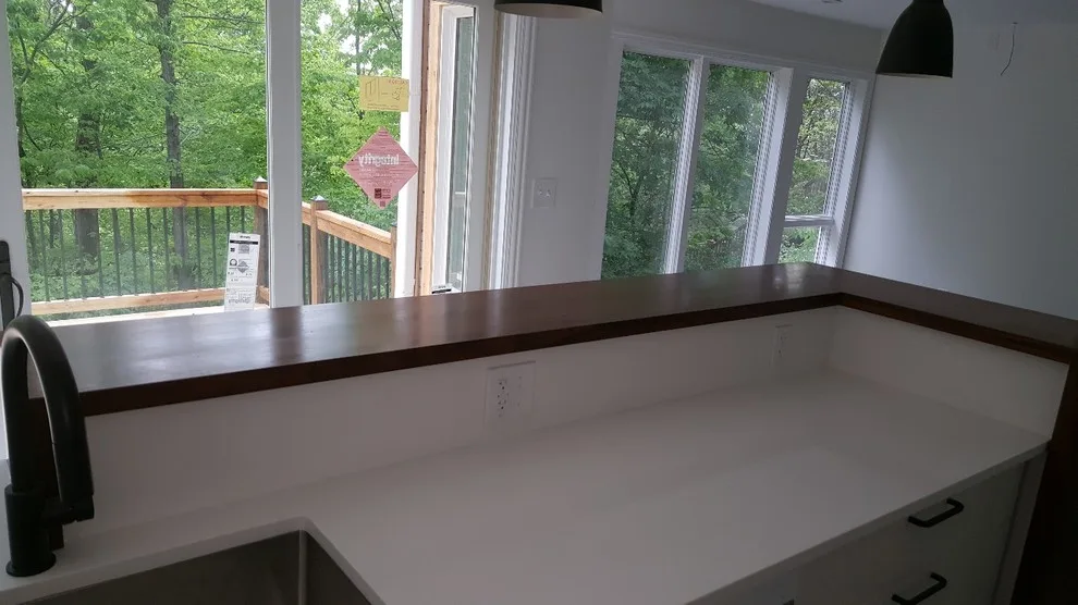 Pristine White Caesarstone Quartz with a Waterfall Edge by Ohio Valley Solid Surface - Photo 4